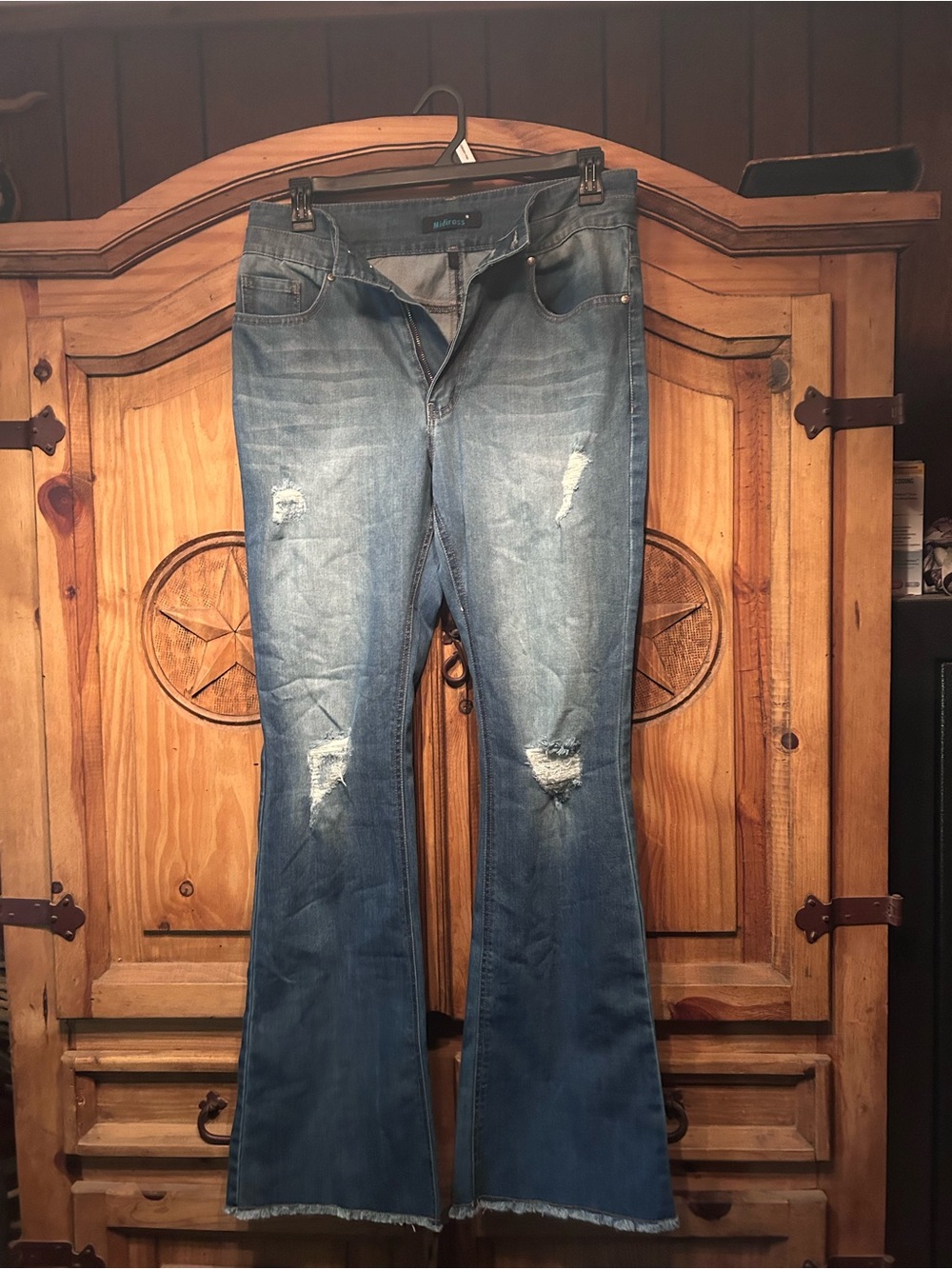 Blue Distressed Flare Jeans with Raw Hem
